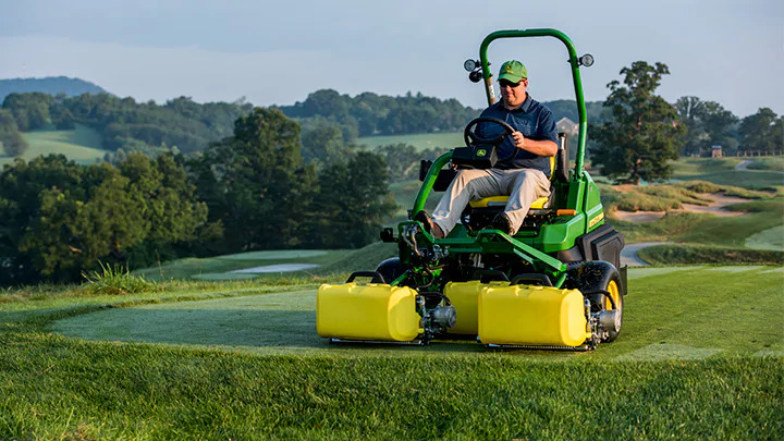 Man riding lawn mower